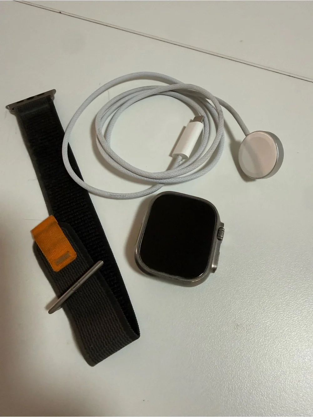 Apple Smartwatch with Black Woven Strap and Silver Case